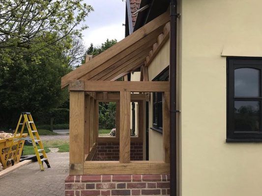 Bespoke oak carpentry in Mendlesham Suffolk pre roofing tiles, by Buildright Suffolk