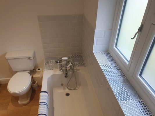 Plumbing, electrics and tiling for bathroom refit in Bury St Edmunds Suffolk by Buildright Suffolk