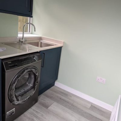 Utility area installed in garage studio conversion in Holbrook