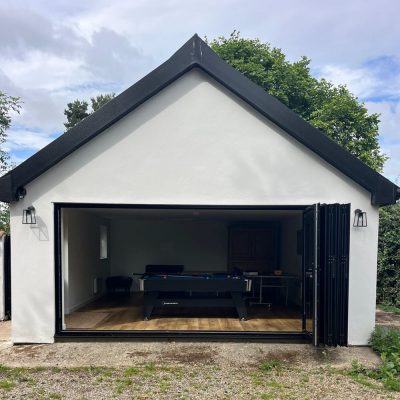 Double garage conversion with bi fold doors for games room in Glenham by Buildright Suffolk